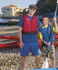 Two Kayakers Standing in Fornt of the Catalina Casino